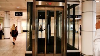 Epic Priceless amp Amazing inground hydraulic glass elevators  Montreal Trudeau Airport YUL [upl. by Marcello883]